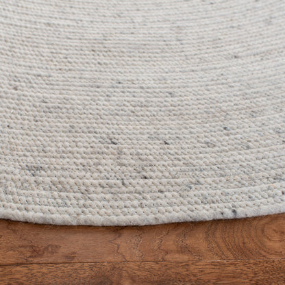 Tapis de campagne en laine tressée à la main SAFAVIEH