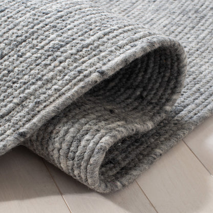 Tapis de campagne en laine tressée à la main SAFAVIEH