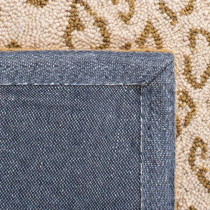 Tapis de jardin solaire Chelsea fait main en laine léopard de style campagnard français SAFAVIEH