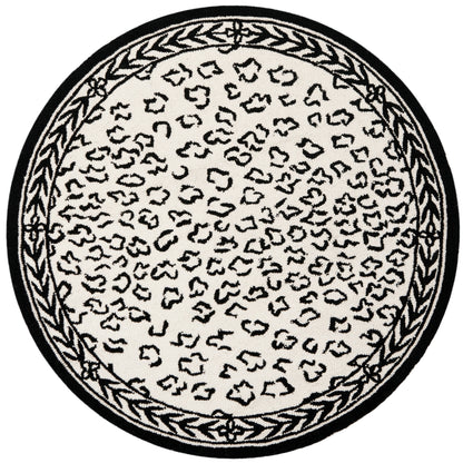 Tapis de jardin solaire Chelsea fait main en laine léopard de style campagnard français SAFAVIEH