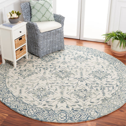 Tapis en laine florale Elvedina fait main SAFAVIEH, teint par immersion