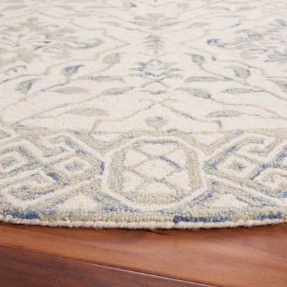 Tapis en laine florale Elvedina fait main SAFAVIEH, teint par immersion