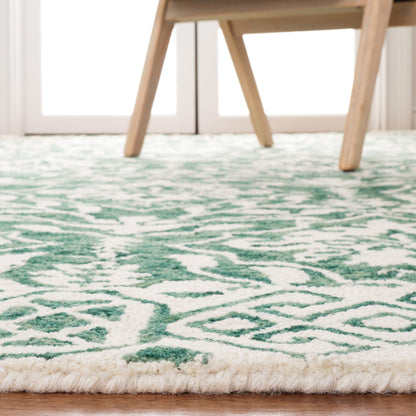 Tapis en laine florale Elvedina fait main SAFAVIEH, teint par immersion