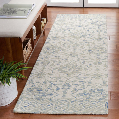 Tapis en laine florale Elvedina fait main SAFAVIEH, teint par immersion