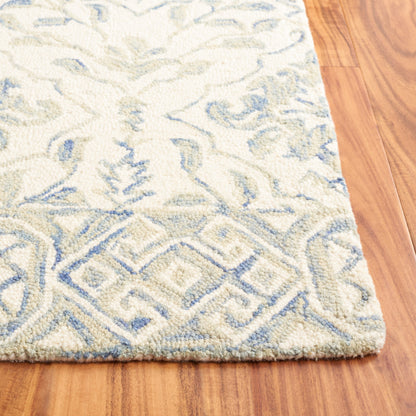Tapis en laine florale Elvedina fait main SAFAVIEH, teint par immersion
