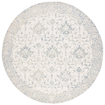 Tapis en laine florale Elvedina fait main SAFAVIEH, teint par immersion