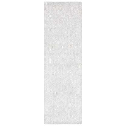 Tapis en viscose à chevrons Glamour Ostilia fait main SAFAVIEH