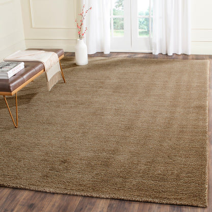 Tapis moderne en laine fait main SAFAVIEH avec bordure en palmier de l'Himalaya