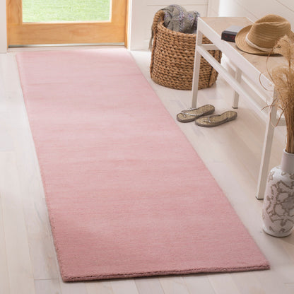 Tapis moderne en laine fait main SAFAVIEH avec bordure en palmier de l'Himalaya