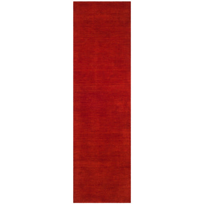 Tapis moderne en laine fait main SAFAVIEH avec bordure en palmier de l'Himalaya