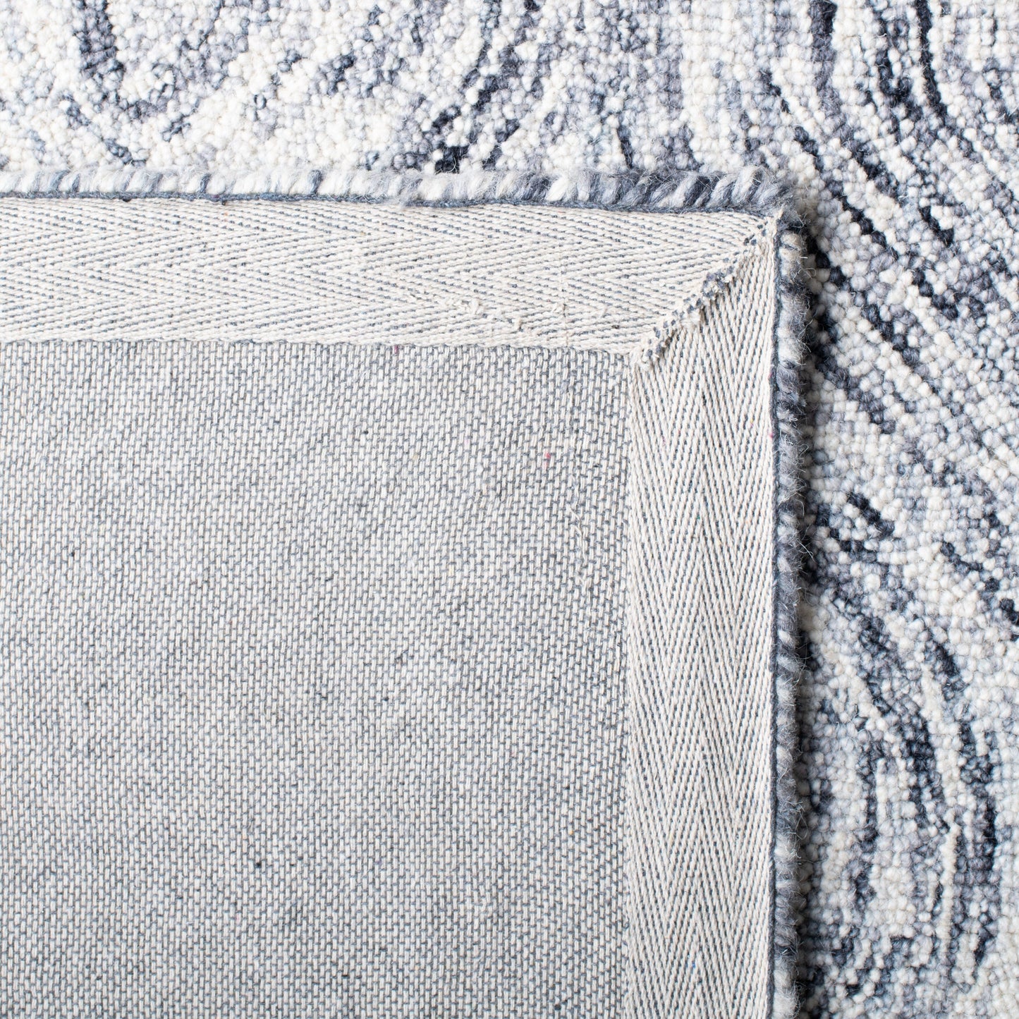 SAFAVIEH Tapis en laine Ikat Lilija fait main