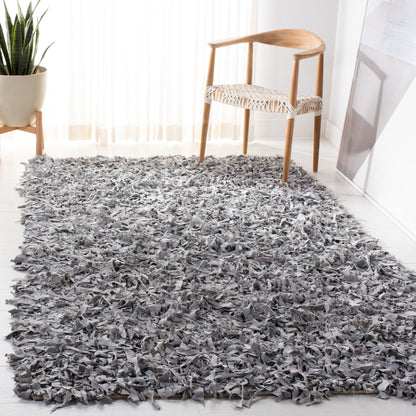 Tapis décoratif moderne en cuir fait main SAFAVIEH Shag Doinita