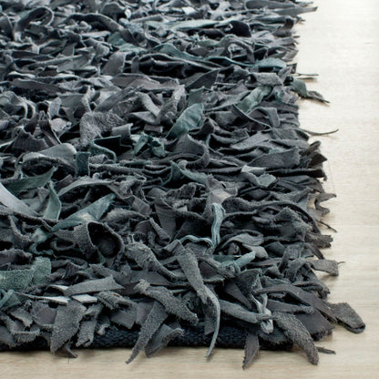 Tapis décoratif moderne en cuir fait main SAFAVIEH Shag Doinita