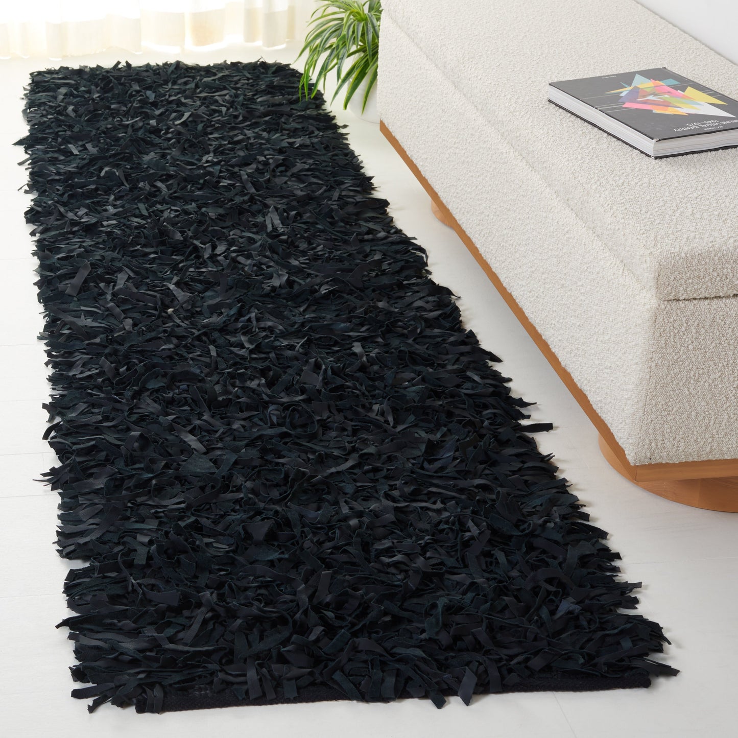 Tapis décoratif moderne en cuir fait main SAFAVIEH Shag Doinita