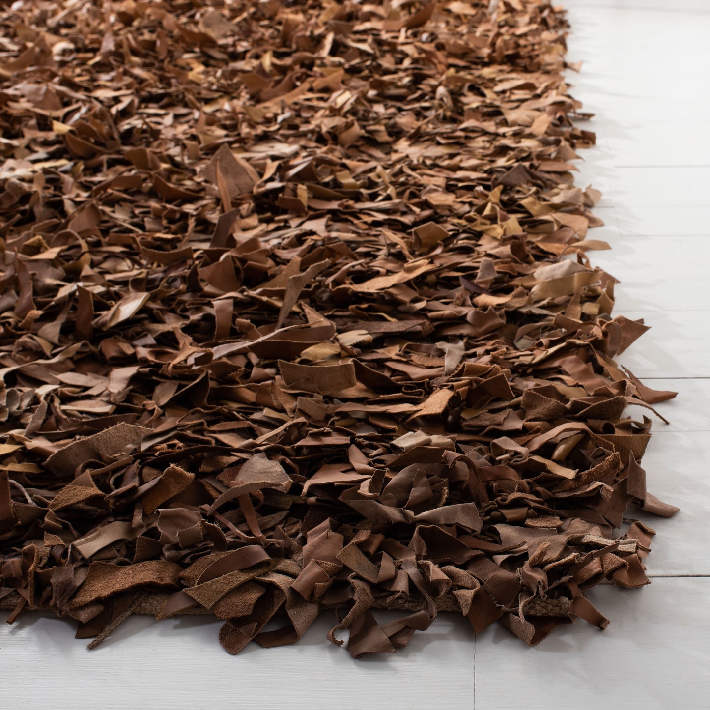 Tapis décoratif moderne en cuir fait main SAFAVIEH Shag Doinita