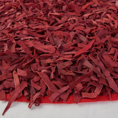 Tapis décoratif moderne en cuir fait main SAFAVIEH Shag Doinita