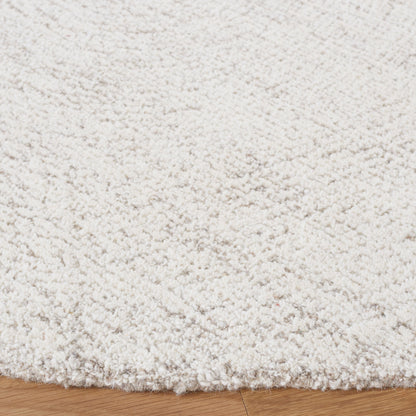 Tapis en laine fait main SAFAVIEH Metro Rozsika de style campagnard français