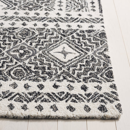 Tapis en laine Lutetia micro-bouclé fait main SAFAVIEH