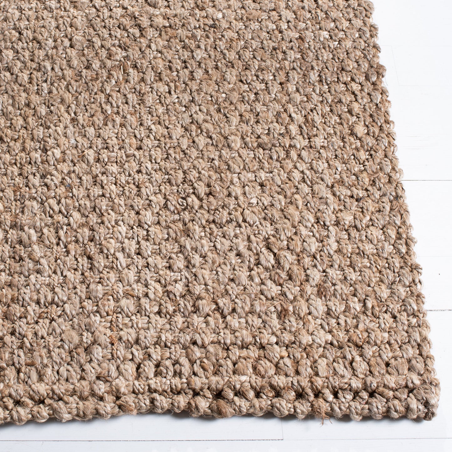 Tapis en jute Dorkas fait main en fibres naturelles SAFAVIEH