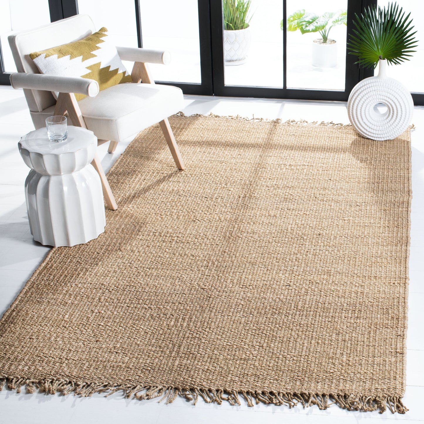 Tapis à franges en jute Eybjorg fait main en fibres naturelles SAFAVIEH