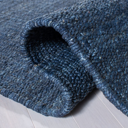 Tapis à franges en jute Eybjorg fait main en fibres naturelles SAFAVIEH