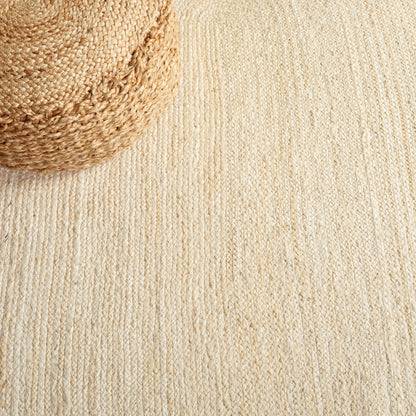 Tapis rond en jute fait main en fibres naturelles Jolette avec bordure SAFAVIEH