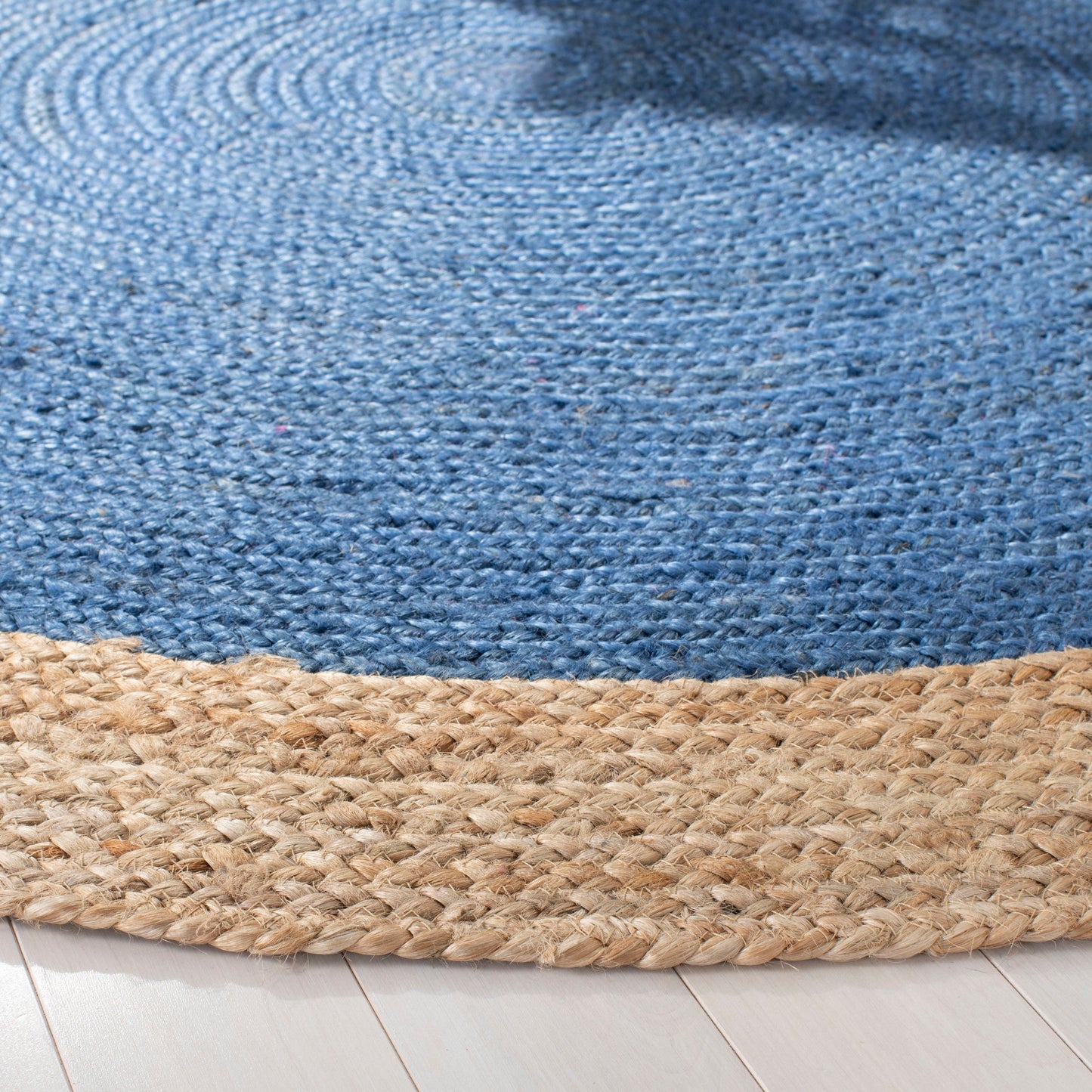 Tapis rond en jute fait main en fibres naturelles Jolette avec bordure SAFAVIEH
