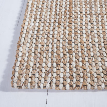 Tapis SAFAVIEH fait main en fibre naturelle Yareli jute et laine.