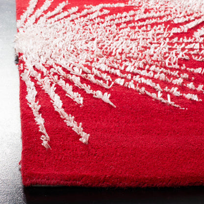 Tapis en laine de Nouvelle-Zélande fait main SAFAVIEH Soho Sade